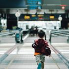 boy running in the airport